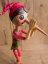 Dřevěný Pinokio v červené čepičce