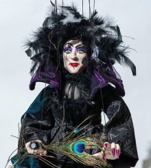 Witch with a peacock quill